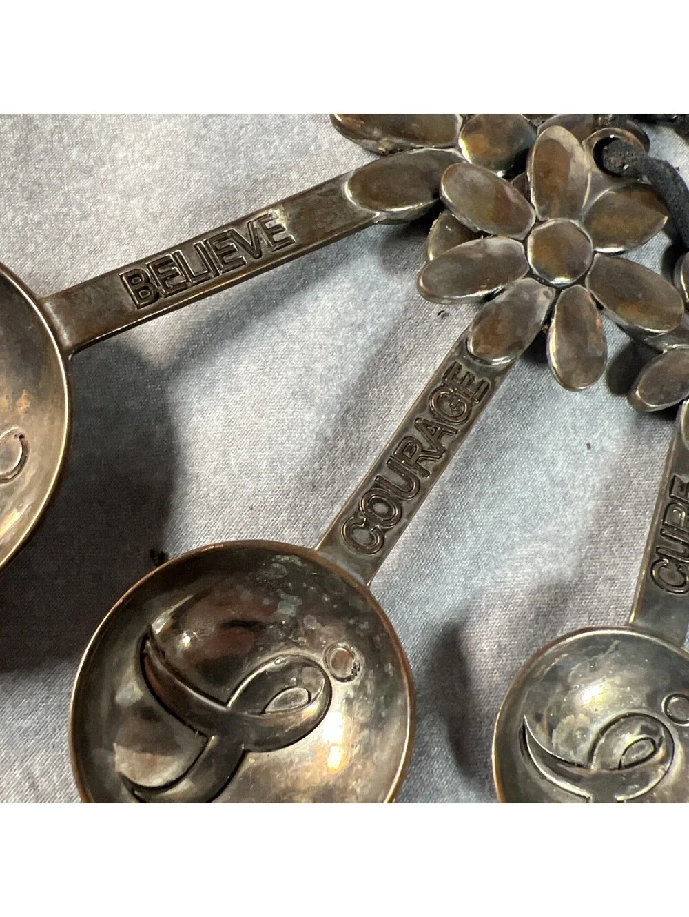 Metal Measuring Spoons With Flower Handle & Cancer Awareness Message